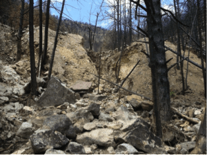 Erosion of mine tailings in 2011 after Fourmile fire (from Murphy, 2011) and battered pickup in September 2013 flood debris, Fourmile Canyon, Colorado